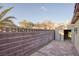 Paver backyard enclosed with a block wall, including a storage shed at 2380 Sierra Sunrise St, Las Vegas, NV 89156