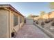 Paver backyard including a storage shed along the back wall at 2380 Sierra Sunrise St, Las Vegas, NV 89156