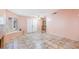 Spacious living room featuring tile flooring and a cozy fireplace at 2380 Sierra Sunrise St, Las Vegas, NV 89156