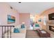 Comfortable staged living room featuring a fireplace and open floor plan at 2380 Sierra Sunrise St, Las Vegas, NV 89156