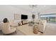 Bright living room features stylish furniture, large windows, and modern decor at 244 Paraggi Bay Dr, Henderson, NV 89011