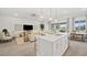 Open-concept living space with a modern kitchen, dining area, and comfortable living room at 244 Paraggi Bay Dr, Henderson, NV 89011