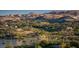 Picturesque view of luxury homes along the waterfront in a beautiful, upscale community at 244 Paraggi Bay Dr, Henderson, NV 89011