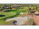 Scenic view of the well-maintained golf course featuring sand traps and mature trees at 2505 Showcase Dr, Las Vegas, NV 89134