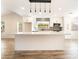 Bright kitchen with white cabinets, stainless steel appliances, and a large center island at 2505 Showcase Dr, Las Vegas, NV 89134