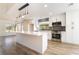 Bright kitchen with white cabinets, stainless steel appliances, and a center island at 2505 Showcase Dr, Las Vegas, NV 89134