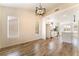 Open-concept space with modern lighting fixtures with a kitchen area at 2505 Showcase Dr, Las Vegas, NV 89134