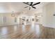 Open-concept living space with updated kitchen, modern lighting, and vaulted ceilings at 2505 Showcase Dr, Las Vegas, NV 89134