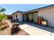 Private back patio area with grill, vintage cabinets and seating at 2600 E Owens Ave, North Las Vegas, NV 89030