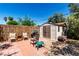 Private back yard features mature shade trees, shed, patio and grill at 2600 E Owens Ave, North Las Vegas, NV 89030