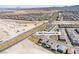 High-angle aerial showcases the neighborhood's layout and the home's prime position near main thoroughfares at 2601 Gallarate Dr, Henderson, NV 89044