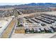 Expansive aerial shot displaying the property's location within a vibrant, growing community with mountain views at 2601 Gallarate Dr, Henderson, NV 89044