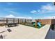 Beautifully landscaped backyard with a hot tub, playground, and plenty of room for outdoor dining at 2601 Gallarate Dr, Henderson, NV 89044