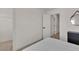 Cozy bedroom featuring a walk-in closet, a bed, and minimalist decor at 2601 Gallarate Dr, Henderson, NV 89044