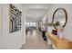 Elegant entryway features decor, console table, and tiled floors leading to the open-concept living area at 2601 Gallarate Dr, Henderson, NV 89044