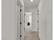 Neutral hallway with several paneled doors, creating a clean and modern look at 2601 Gallarate Dr, Henderson, NV 89044