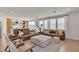 Bright living room boasts comfortable seating, stylish decor, and seamless transition to the kitchen at 2601 Gallarate Dr, Henderson, NV 89044