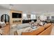 Stylish living room features a modern fireplace, comfortable seating, and elegant decor at 2601 Gallarate Dr, Henderson, NV 89044
