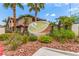 Beautifully landscaped community sign surrounded by lush flowers and well-manicured plants at 2606 Durango Dr # 181, Las Vegas, NV 89117