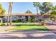 Exterior image showing a putting green with apartment building. Lush green lawn at 2606 Durango Dr # 181, Las Vegas, NV 89117