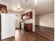 Traditional kitchen features cherry cabinets and a full-size white refrigerator at 2606 Durango Dr # 181, Las Vegas, NV 89117
