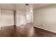 Hardwood floors and neutral walls create a bright and spacious atmosphere in this open-concept living space at 2606 Durango Dr # 181, Las Vegas, NV 89117
