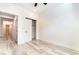 Minimalist bedroom with hallway access and modern interior design at 2651 Solera Moon Dr, Henderson, NV 89044