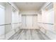 Large walk-in closet with modern shelving and hardwood floors throughout at 2651 Solera Moon Dr, Henderson, NV 89044