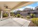 Covered patio area with ceiling fan and a view of the landscaped backyard at 2651 Solera Moon Dr, Henderson, NV 89044