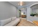Hallway view into home office with seamless flooring and decor niche at 2780 Gallant Hills Dr, Las Vegas, NV 89135