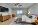 Bright bedroom featuring modern decor and a comfortable seating area with a view at 2780 Gallant Hills Dr, Las Vegas, NV 89135