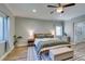 Stylish bedroom showcasing a comfortable bed, modern accents, and ample natural light at 2780 Gallant Hills Dr, Las Vegas, NV 89135