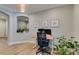 Home office with modern desk, contemporary light fixture, and wall decor at 2780 Gallant Hills Dr, Las Vegas, NV 89135