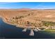 Scenic view of waterfront resort with boat docks, offering stunning views of the lake and mountains at 30 Via Mantova # 109, Henderson, NV 89011