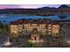 Beautiful lakeside condo building boasting tile roofing and colorful exteriors at 30 Via Mantova # 109, Henderson, NV 89011