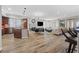 Open concept floor plan offers views of the kitchen and living room, complete with modern fixtures at 30 Via Mantova # 109, Henderson, NV 89011