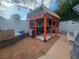 Backyard shows a covered patio with furniture and barbeque in a fenced yard at 3164 Elmrock Pl, Las Vegas, NV 89121