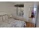 Bright bedroom featuring built-in shelving, storage, and a view to another bedroom at 3164 Elmrock Pl, Las Vegas, NV 89121