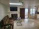 Comfortable living space with fireplace and easy access to the kitchen and outdoor patio at 3164 Elmrock Pl, Las Vegas, NV 89121