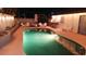 Backyard view showcasing a sparkling in-ground pool and seating area for relaxing at 3164 Elmrock Pl, Las Vegas, NV 89121