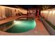 Backyard view showcasing a sparkling in-ground pool, perfect for outdoor entertainment at 3164 Elmrock Pl, Las Vegas, NV 89121
