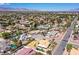 Residential neighborhood featuring homes with pools and desert landscaping nestled against a mountain backdrop at 3165 S Monte Cristo Way, Las Vegas, NV 89117