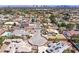 Expansive view of a community featuring homes with pools, mature landscaping, and well-maintained streets at 3165 S Monte Cristo Way, Las Vegas, NV 89117
