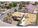 Beautiful home with a pool, boat parking, and a storage shed, surrounded by mature landscaping and neighboring houses at 3165 S Monte Cristo Way, Las Vegas, NV 89117