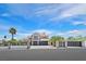 Charming two-story home featuring a tile roof, three car garage, and a well-maintained landscaped yard at 3165 S Monte Cristo Way, Las Vegas, NV 89117