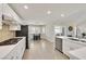 Bright kitchen with stainless steel appliances, eat in dining, and sliding door to the rear yard at 3165 S Monte Cristo Way, Las Vegas, NV 89117