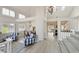 Bright living room with staircase, high ceilings, open floor plan, and natural light at 3165 S Monte Cristo Way, Las Vegas, NV 89117