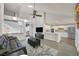 Spacious open-concept living room with an open kitchen, vaulted ceilings, and modern finishes throughout at 3165 S Monte Cristo Way, Las Vegas, NV 89117