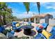 Cozy patio area with plush outdoor seating, perfect for entertaining guests and enjoying summer evenings at 3165 S Monte Cristo Way, Las Vegas, NV 89117