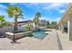 This gorgeous pool features spa, rock accents, desert landscaping, and a spacious stone patio at 3165 S Monte Cristo Way, Las Vegas, NV 89117